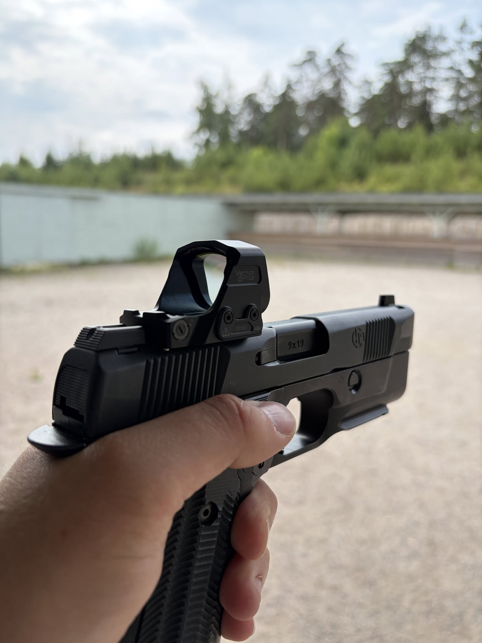 Frenzy FLEX 24x29 red dot on pistol at the range