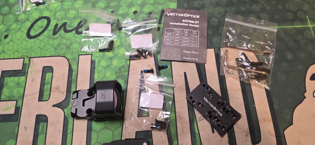 Box contents: Frenzy FLEX 24x29 MRT, Vekey multi-tool, screws and adapter plate Box contents: Frenzy FLEX 24x29 MRT, Vekey multi-tool, screws and adapter plate