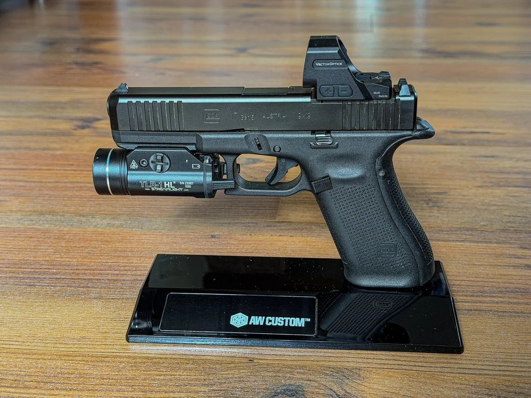 Frenzy FLEX 24x29 MRT Red Dot Sight (SCRD-M76) mounted on a Glock 19 MOS with a weapon light Frenzy FLEX 24x29 MRT Red Dot Sight (SCRD-M76) mounted on a Glock 19 MOS with a weapon light
