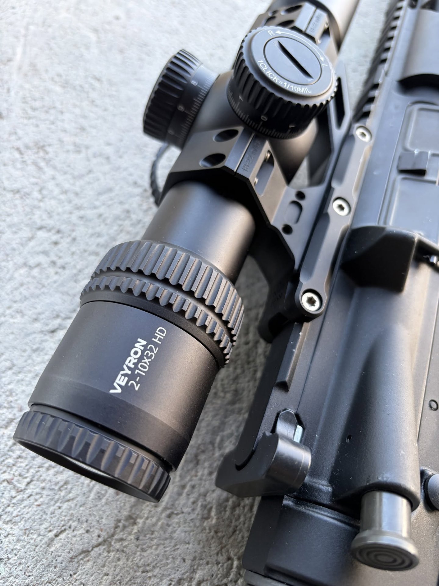 Close-up of the Veyron 2-10x32 HD rifle scope on a rifle