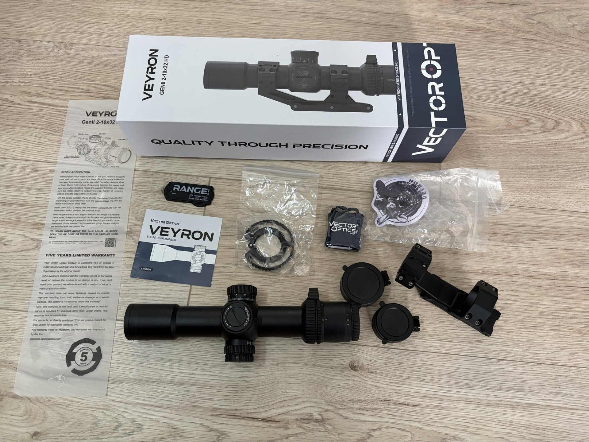 Veyron GenII 2-10x32 HD CTR Rifle Scope box contents laid out on the floor