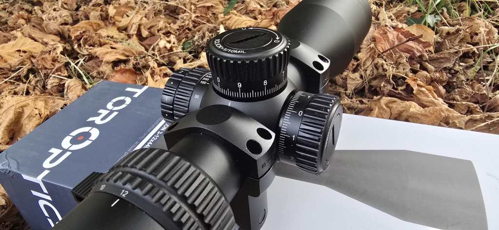 Veyron GenII 3-12x44 HD CTR FFP Rifle Scope lying on its box outdoors